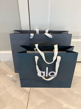 2 ALO Yoga Teal Logo Gift Bags with White Rope Handles